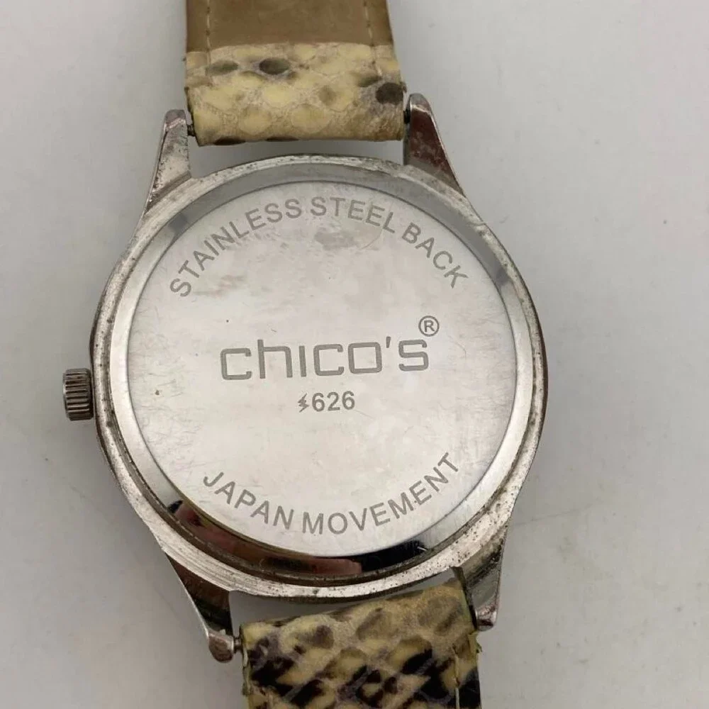 CHICO’S Women's Quartz Watch with Beige Snake-Print Leather Strap. It has a styl